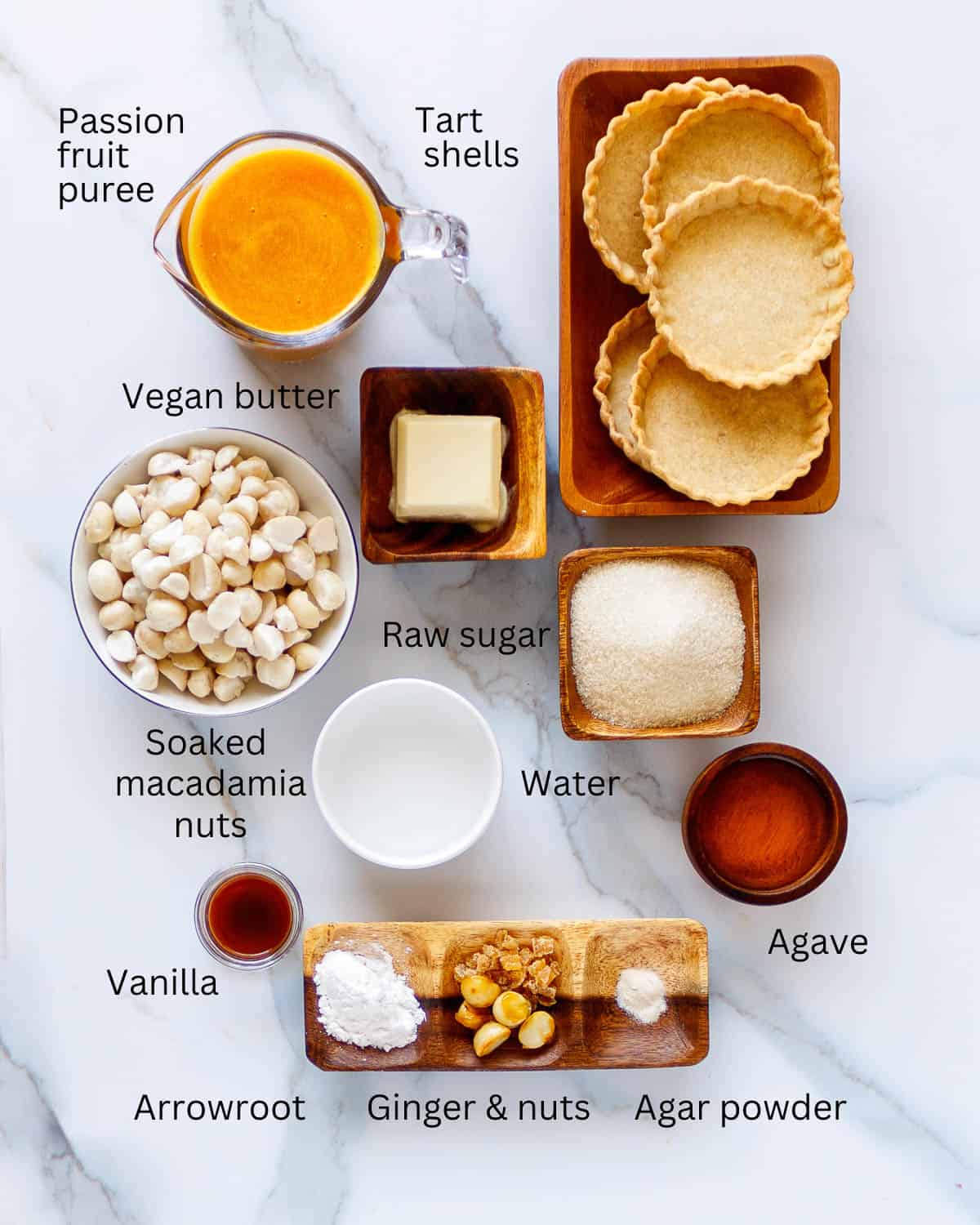 Passion fruit juice, macadamia nuts, tart shells and sweeteners to make small vegan tarts.
