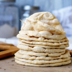 Stack of pillow soft homemade pita breads.