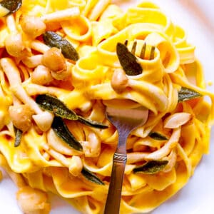 Creamy plant-based fettuccini dish with butternut squash and sage.