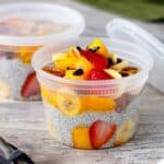 Packable chia pudding layered with fruit and nut toppings.