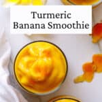 Three glasses of frozen smoothie with turmeric and yellow flowers.