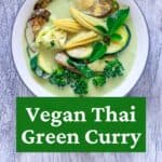 Bowl of green curry in Pinterest graphic with green and white text overlay.